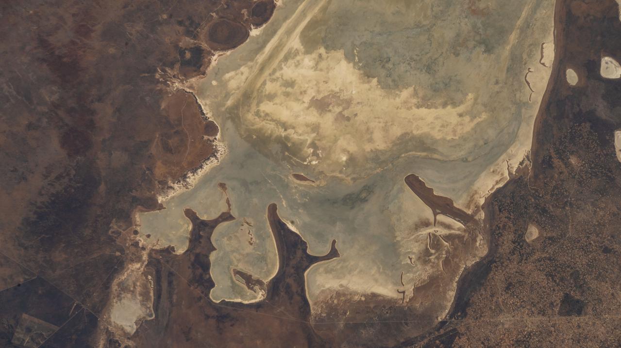 iss067e149386 (June 24, 2022) --- Etosha National Park in northern Namibia, home to a variety of wildlife including elephants, lions, and giraffes, is pictured from the International Space Station as it orbited 262 miles above the African nation.