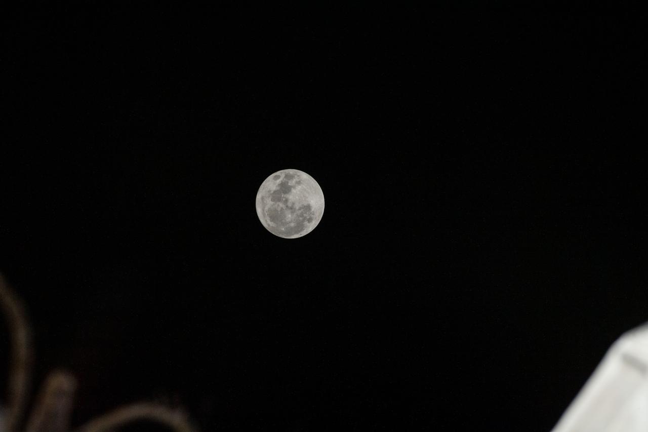 iss067e187059 (July 13, 2022) --- The Full Moon is pictured from the International Space Station as it orbited 261 milies above the Philippine Sea.