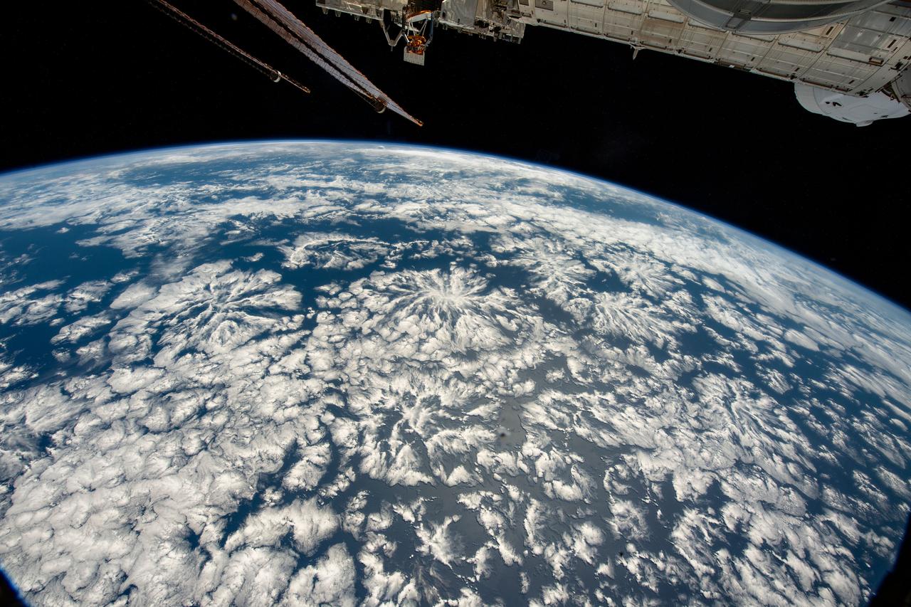 iss067e220400 (July 31, 2022) --- A partly cloudy Pacific Ocean is pictured from the International Space Station as it orbited 259 miles above off the coast of Peru in South America.