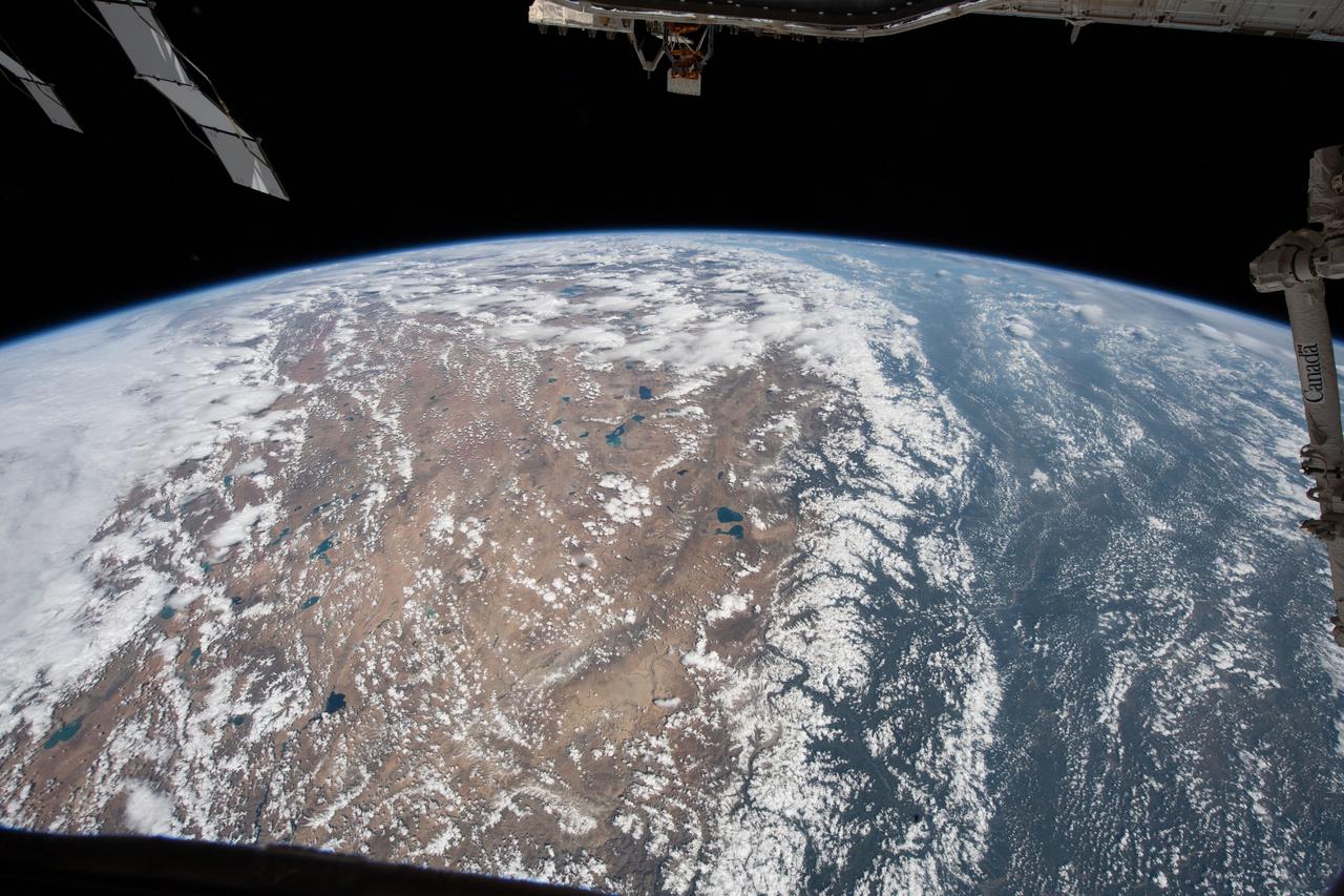 iss067e268010 (Aug. 17, 2022) --- The Himalayas, separating the Indian subcontinent from the Asian continent, are pictured from the International Space Station as it orbited 257 miles above northern India. The Asian mountain range prevents the northern colder air from blowing south allowing the subcontinent's tropical zone to extend farther north than anywhere else in the world.