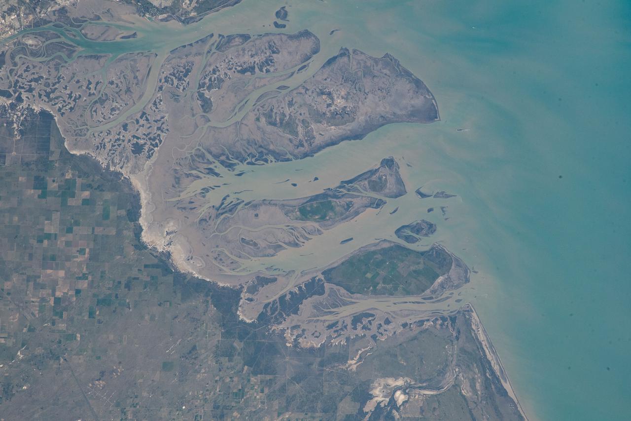iss067e301734 (Aug. 30, 2022) --- The Bahia Blanca, including the three islands of Bermejo, Trinidad, and Anadna, on the coast of Argentina, are pictured from the International Space Station as it orbited 267 miles above the Atlantic Ocean.