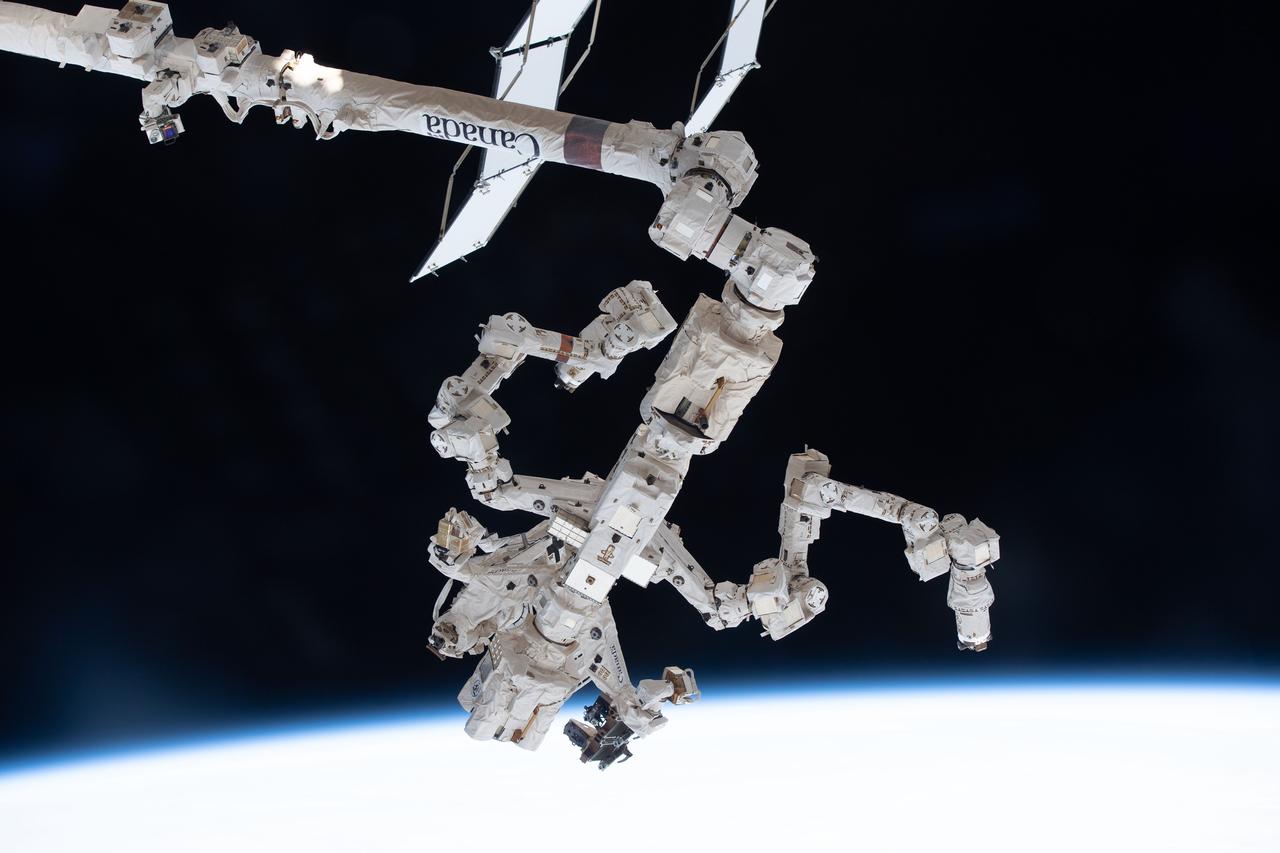 iss067e356122 (Sept. 10, 2022) --- The Special Purpose Dexterous Manipulator (SPDM), also known as Dextre, is pictured attached to the International Space Station's Canadarm2 robotic arm. The SPDM is the orbiting lab's fine-tuned robotic hand designed for precise handling abilities and routine maintenance tasks such as replacing batteries and cameras in the harsh environment of space.