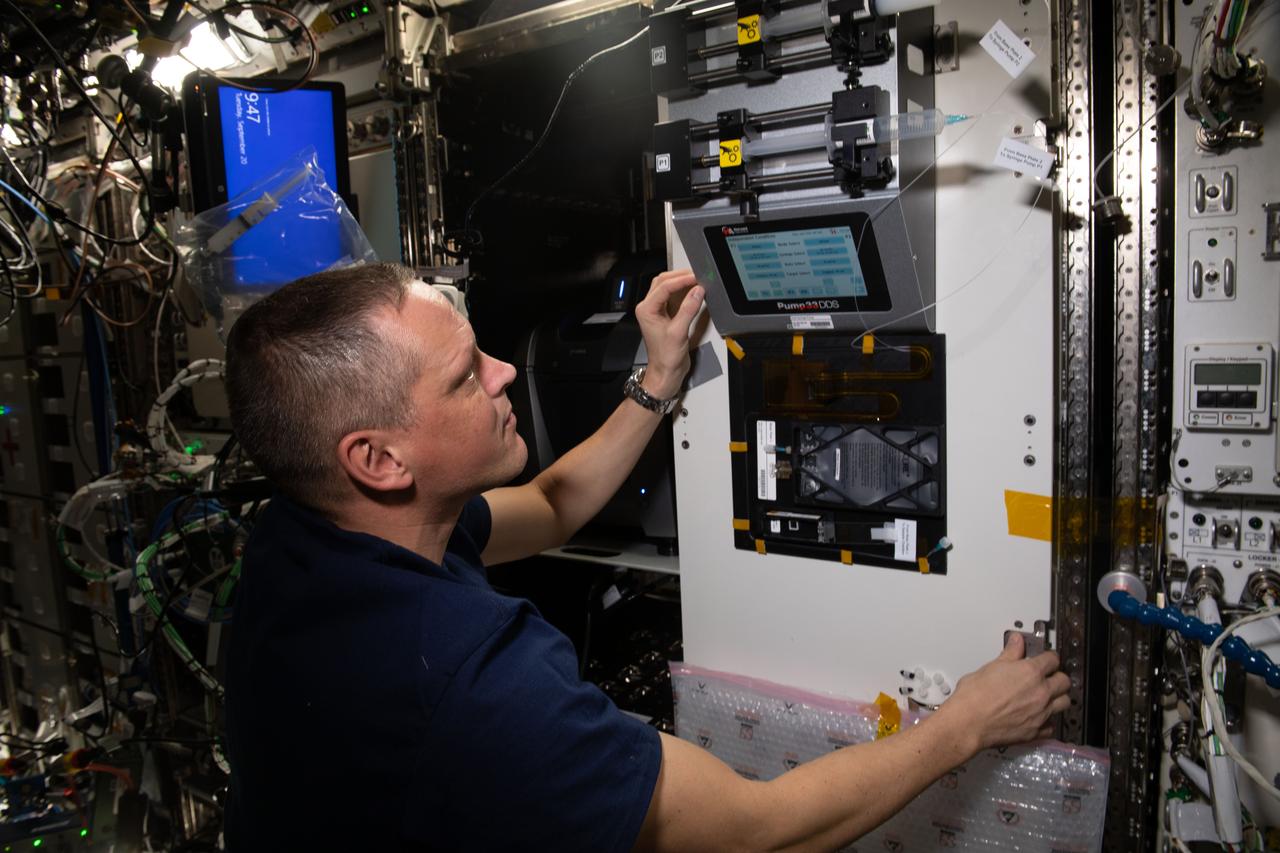 iss067e378832 (9/20/2022) --- NASA astronaut Bob Hines conducts research operations for the Foams and Emulsions physics experiment that observes the dispersion of bubbles and droplets in liquids that may lead to newer, more advanced space research and expanded commercial opportunities in space.