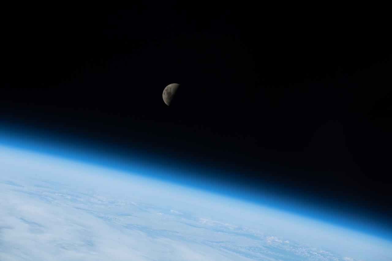 iss068e007201 (Oct. 2, 2022) --- The First Quarter Moon is pictured above the Earth's horizon as the International Space Station orbited 268 miles above the Indian Ocean south of Australia.