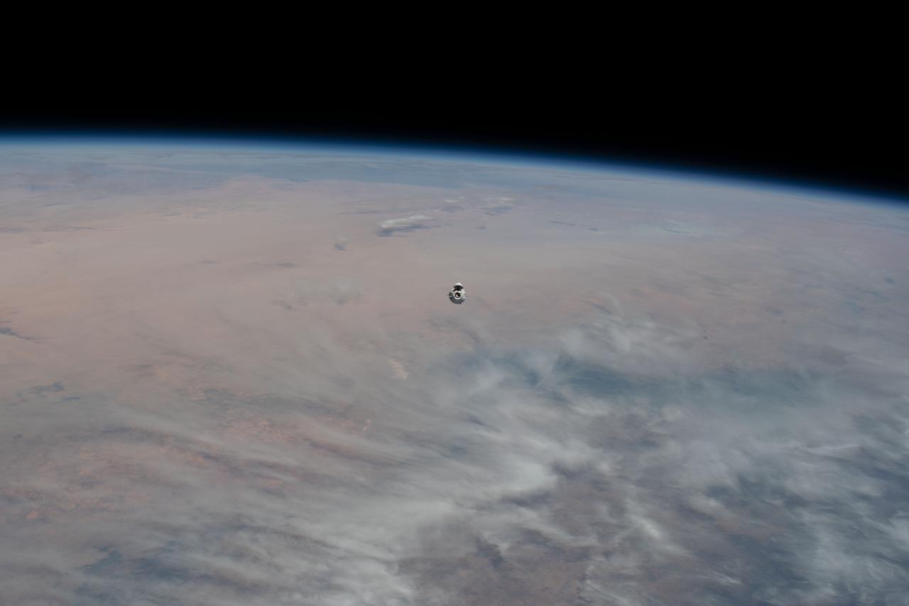 iss068e025148 (Nov. 27, 2022) --- Flying 268 miles over southern Nigeria, the SpaceX Dragon cargo craft, loaded with over 7,700 pounds of science, supplies, and cargo, approaches the International Space Station.