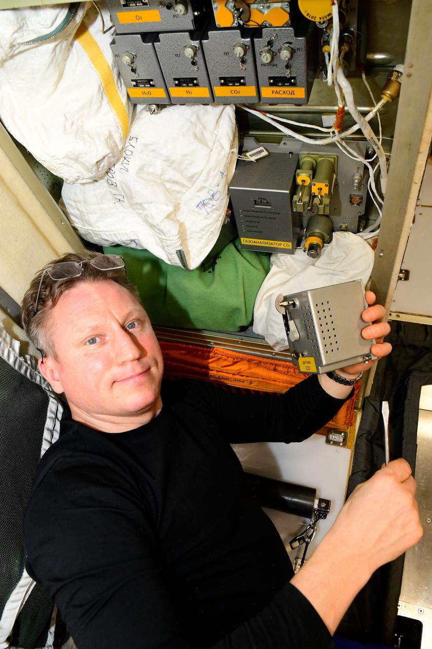 iss068e027634 (Dec. 5, 2022) --- Roscosmos cosmonaut and Expedition 68 Commander Sergey Prokopyev works on components for an Orlan spacesuit aboard the International Space Station's Poisk module. Credit: Roscosmos