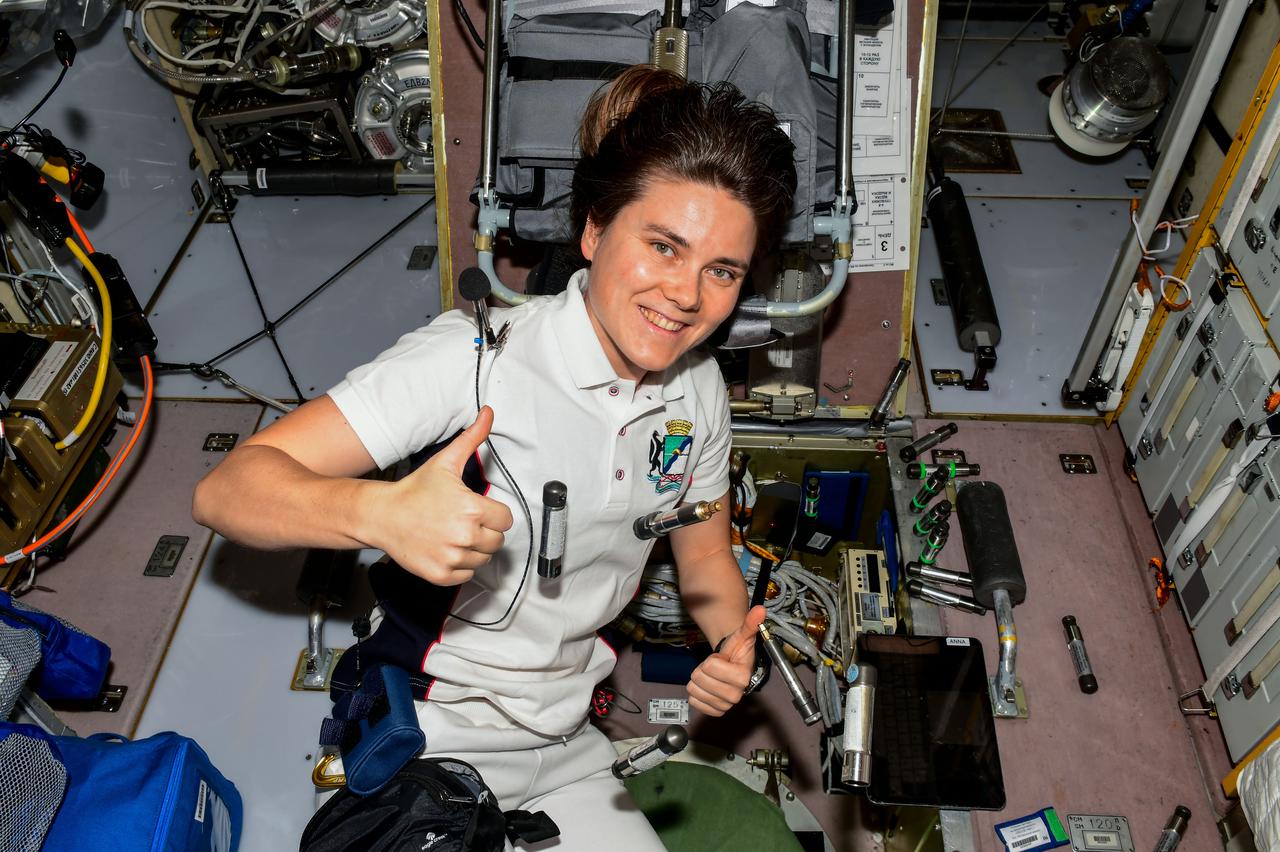 iss068e041015 (Jan. 19, 2023) --- Roscosmos cosmonaut and Expedition 68 Flight Engineer Anna Kikina installs dosimeters, or radiation detectors, and collects data from them aboard the International Space Station. Credit: Roscosmos