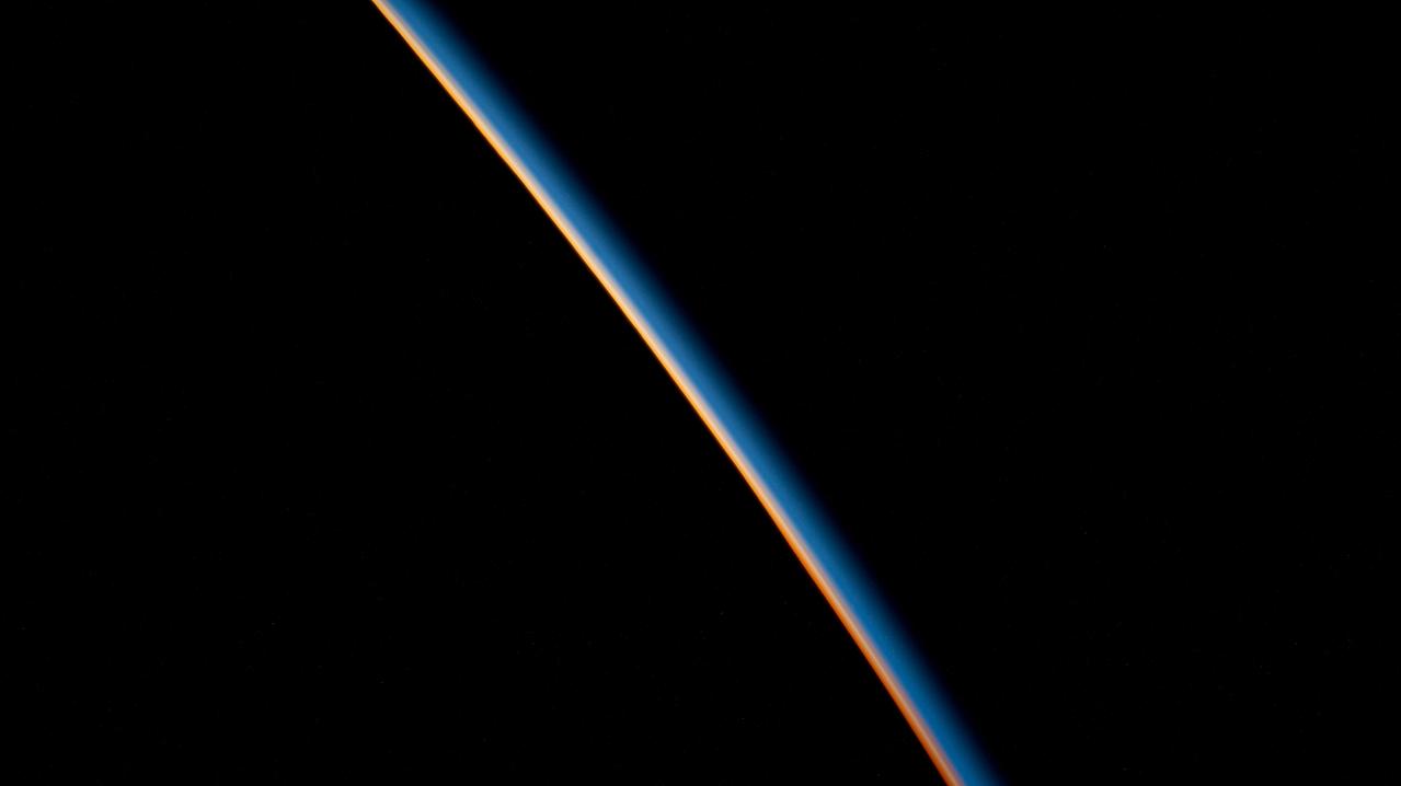 iss068e054895 (Feb. 17, 2023) --- The last rays of an orbital sunset illuminate the Earth's atmosphere in this photograph from the International Space Station as it orbited 269 miles above the Atlantic Ocean off the coast Argentina.