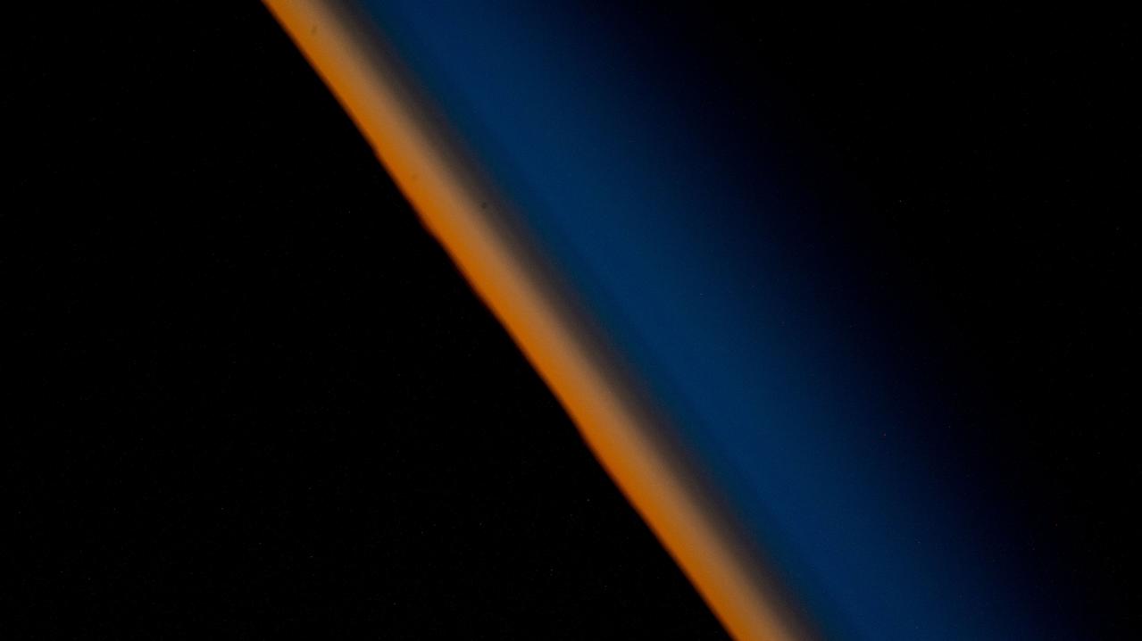 iss068e054896 (Feb. 17, 2023) --- The last rays of an orbital sunset fade into the Earth's atmosphere in this photograph from the International Space Station as it orbited 269 miles above the Atlantic Ocean off the coast of the Falkland Islands, or the Islas Malvinas.