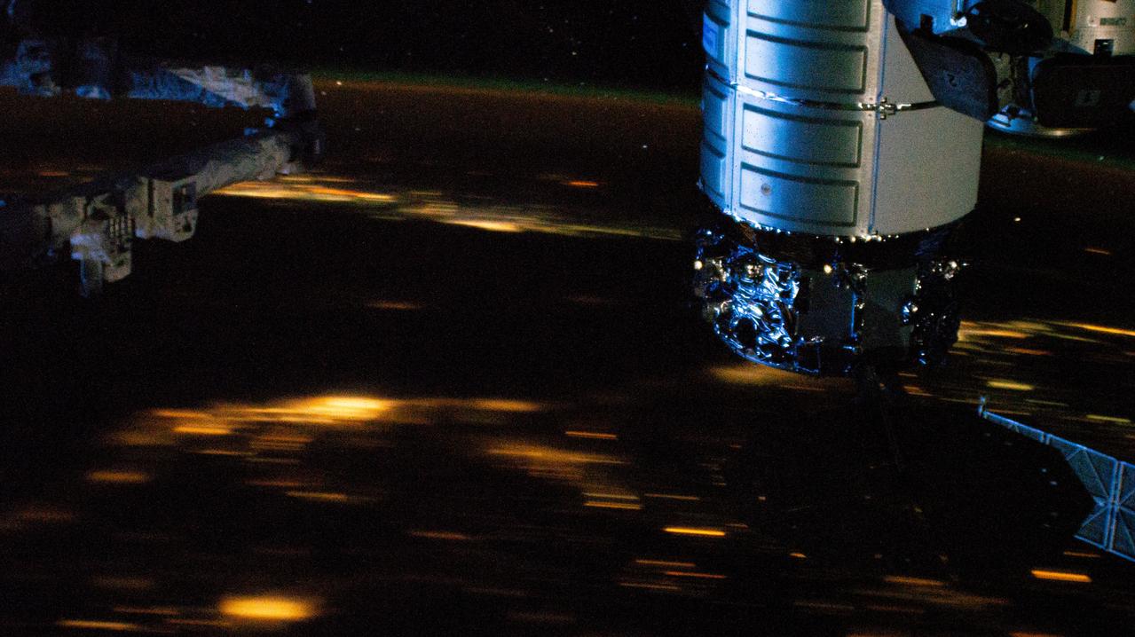 iss068e060810 (Feb. 28, 2023) --- At top right, is the Northrop Grumman Cygnus space freighter berthed to the International Space Station's Unity module. The orbital outpost was soaring 262 miles above the English Channel off the coast of France in this nighttime photograph from an external high-definition camera.