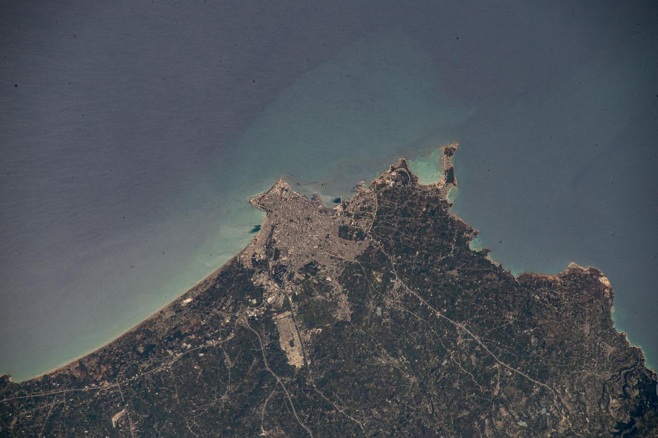 iss069e000774 (April 3, 2023) --- Syria's principal port city of Latakia, on the Mediterranean coast, was pictured by UAE (United Arab Emirates) astronaut and Expedition 69 Flight Engineer Sultan Alneyadi from the International Space Station as it orbited 262 miles above.