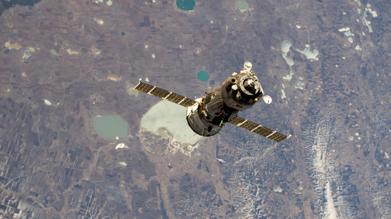 iss069e000997 (April 6, 2023) --- The Soyuz MS-23 crew ship approaches the International Space Station's Prichal docking module after undocking earlier from the Poisk module. Aboard the MS-23 during the 37-minute relocation maneuver were, NASA astronaut Frank Rubio with Roscosmos cosmonauts Sergey Prokopyev and Dmitri Petelin. Both spacecraft were orbiting 263 miles above eastern Kazakhstan at the time of this photograph.