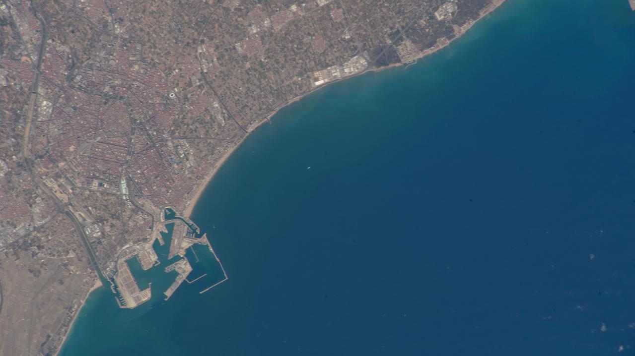 iss069e001453 (April 8, 2023) --- The port city of Valencia on Spain's Balearic Sea coast is pictured from an external high definition camera on the International Space Station as it orbited 263 miles above.