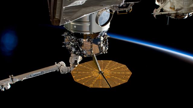 NASA image: The Cygnus space freighter in the grip of the Canadarm2