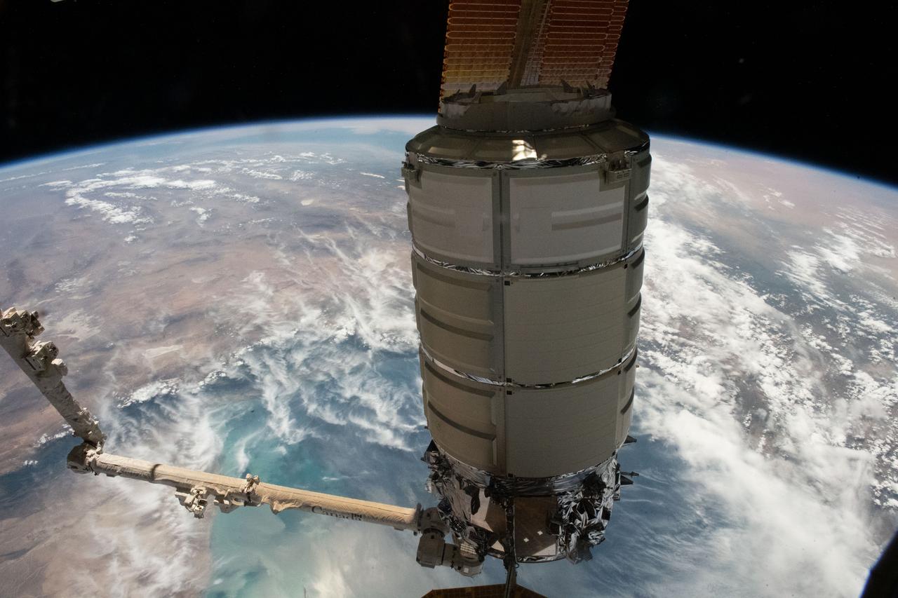 iss069e004895 (April 21, 2023) --- The Cygnus space freighter from Northrop Grumman is pictured in the grips of the Canadarm2 robotic arm as the International Space Station orbited 261 miles above the Caspian Sea off the coast of Turkmenistan.