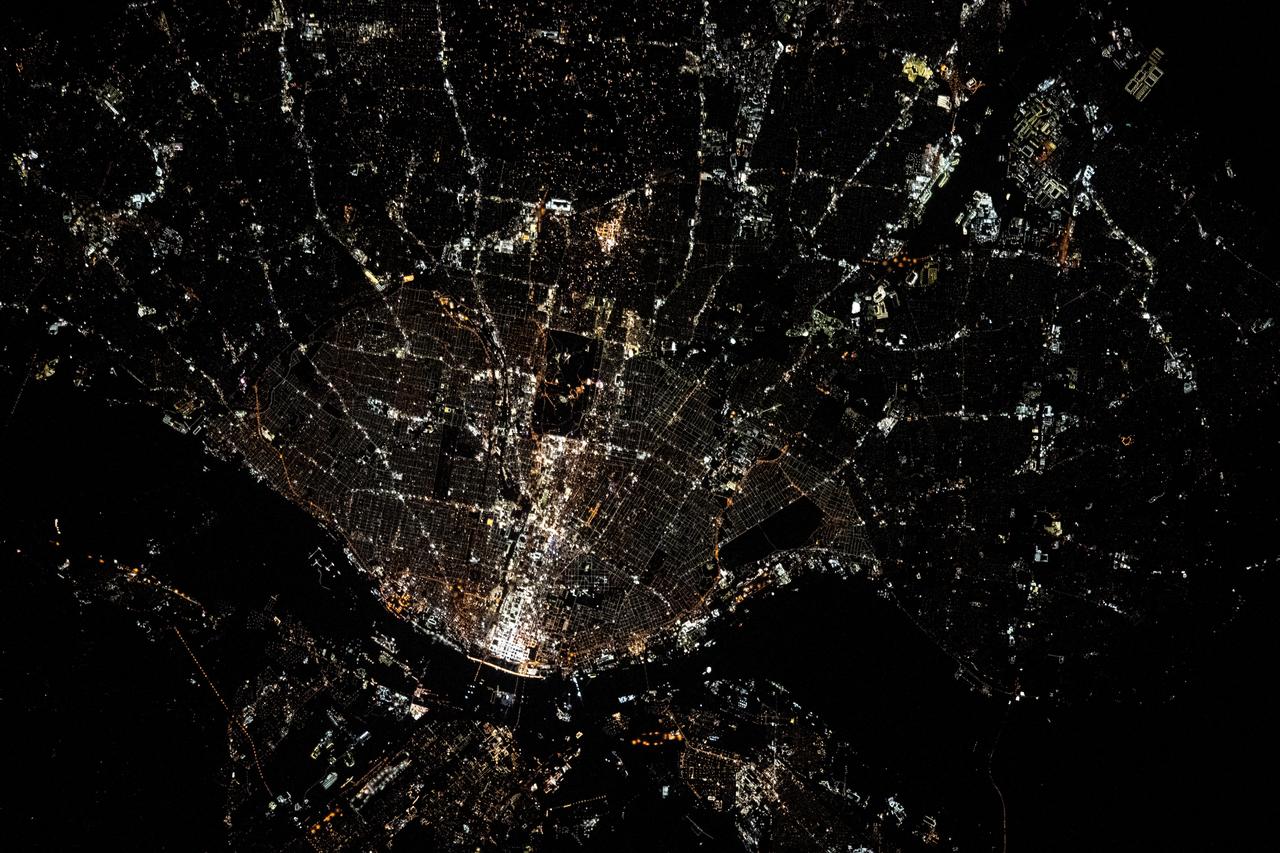 iss069e008226 (May 2, 2023) --- The city lights of St. Louis, Missouri, and its suburbs, fan out west of the Mississippi River in this photograph from the International Space Station as it orbited 262 miles above. The Mississippi separates the Show-Me State from the Prairie State of Illinois.