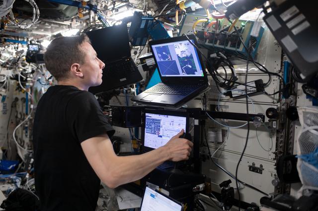NASA image: Astronaut Woody Hoburg participates in robotics training