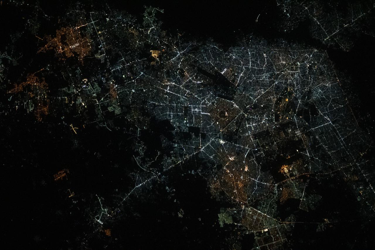 iss069e009939 (May 10, 2023) --- The city lights of Lahore, Pakistan's second largest city, were pictured by UAE (United Arab Emirates) astronaut and Expedition 69 Flight Engineer Sultan Alneyadi from the International Space Station as it orbited 259 miles above.