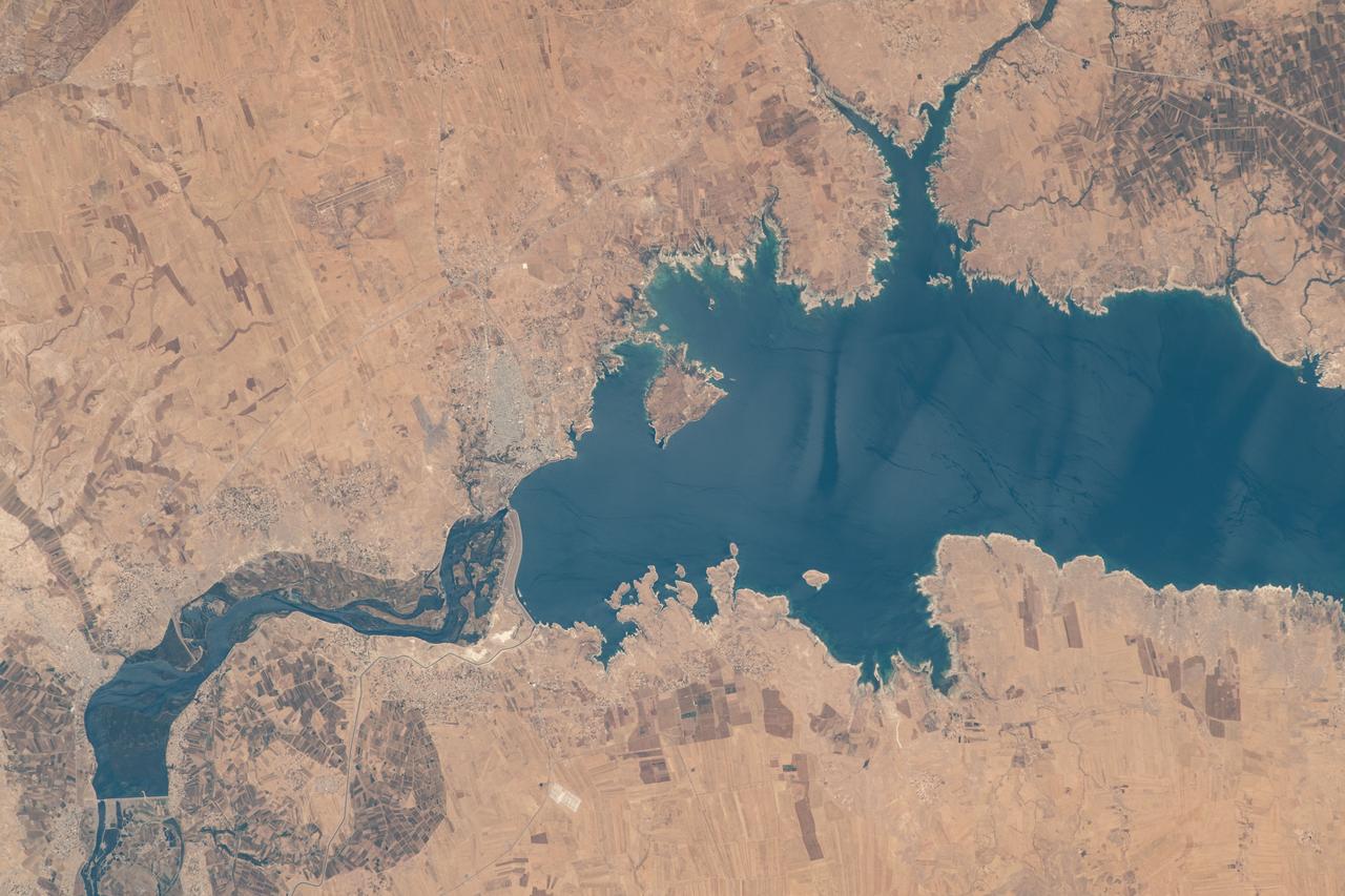 iss069e015083 (May 31, 2023) --- Lake Assad in Syria, a reservoir on the Euphrates River, is pictured from the International Space Station as it orbited 258 miles above the Middle East nation.