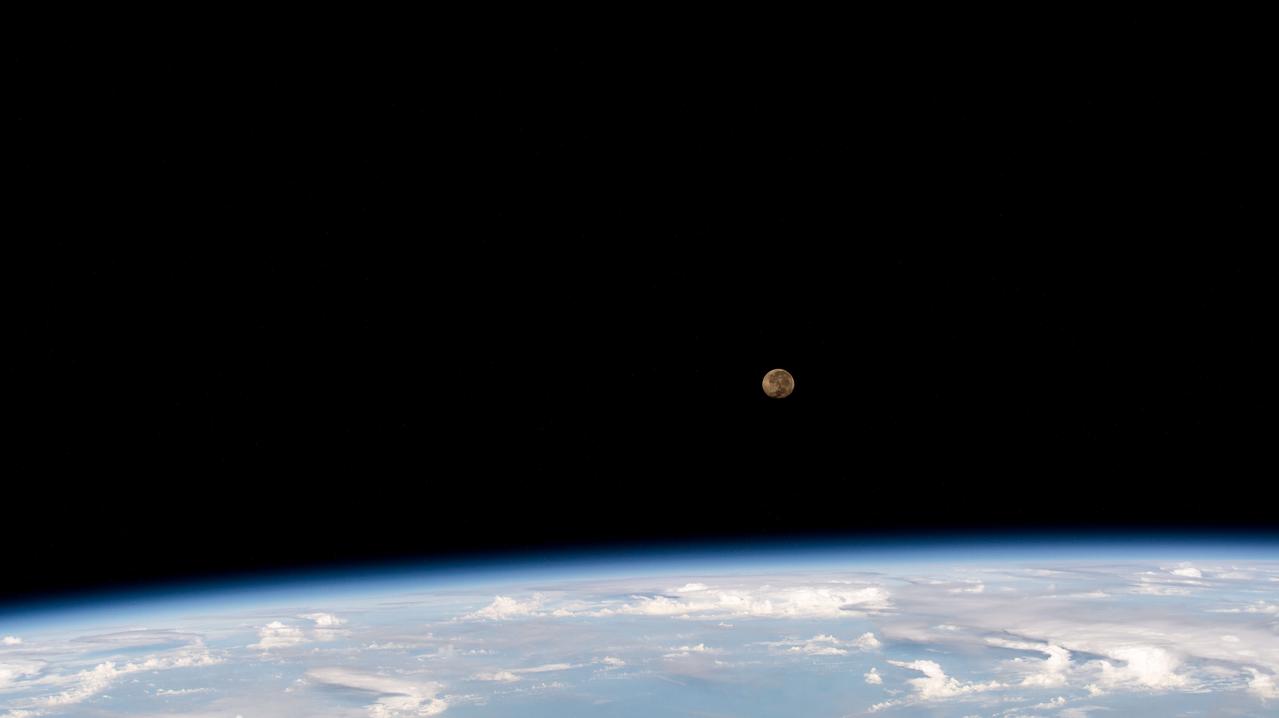 iss069e018196 (June 6, 2023) --- The waning gibbous Moon is pictured above Earth's horizon as the International Space Station was orbiting 257 miles over the Celebes Sea off the coast of Malaysia.
