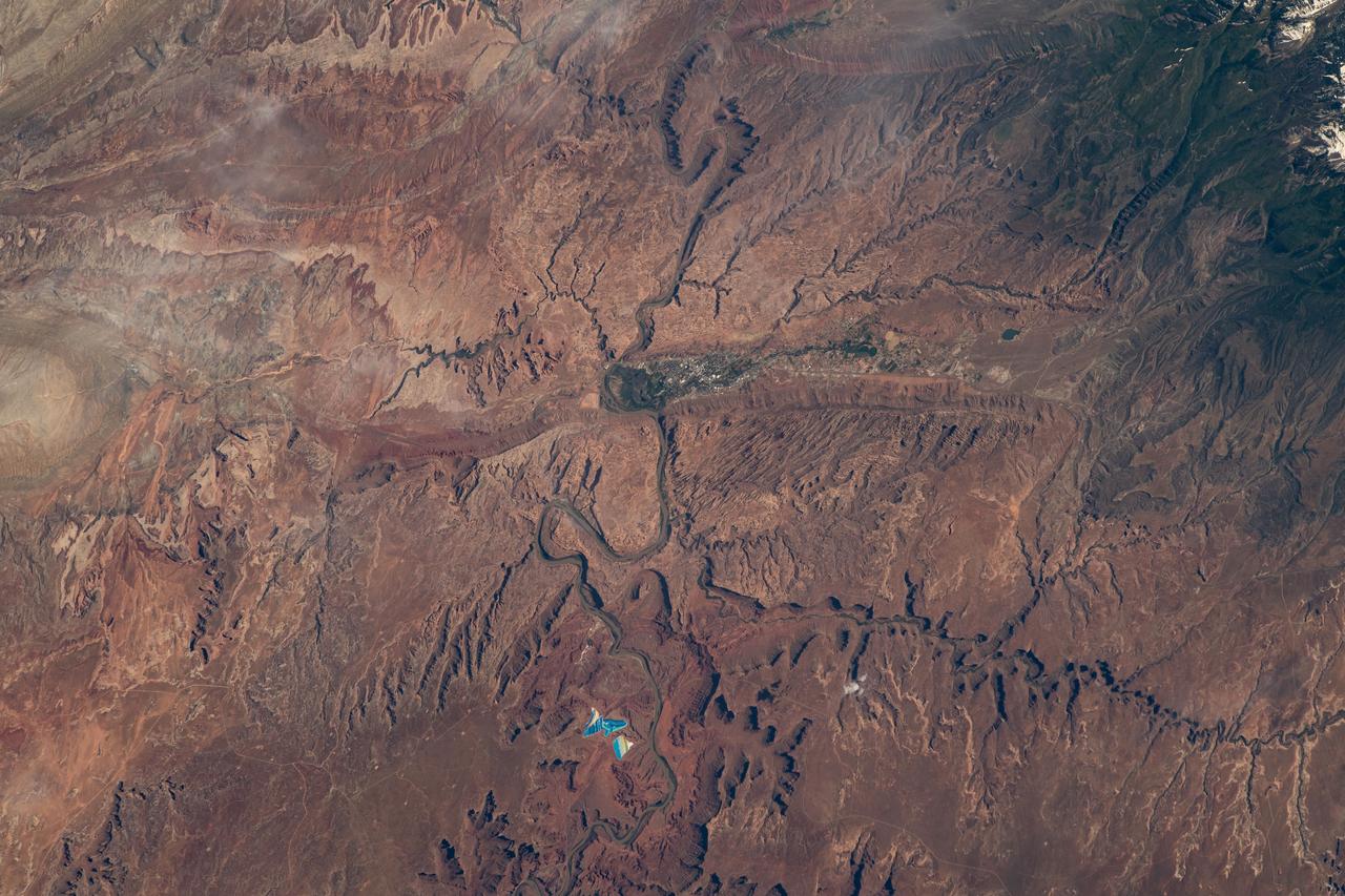 iss069e020294 (June 12, 2023) --- Moab, Utah, near the scenic Arches and Canyonlands National Parks, is pictured from the International Space Station as it orbited 258 miles above.