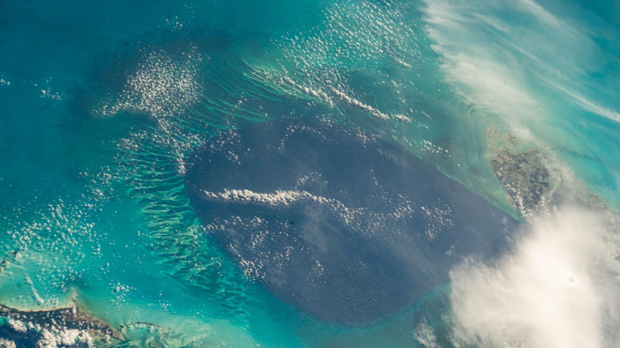 iss069e022551 (June 16, 2023) --- A portion of The Bahamas, in the Atlantic Ocean southeast of Florida, is pictured from the International Space Station as it orbited 257 miles above.