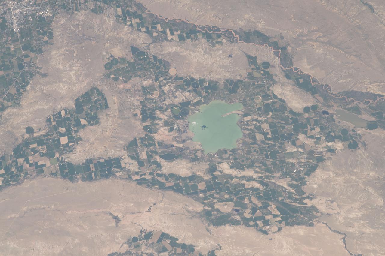 iss069e025528 (June 26, 2023) --- Ocean Lake located in Wyoming's Wind River Reservation is pictured from the International Space Station as it orbited 260 miles above the United States.