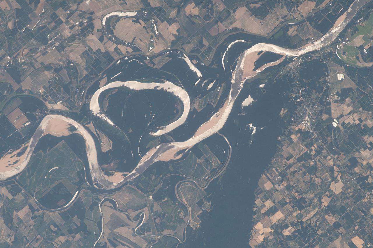 iss069e025544 (June 26, 2023) -- The Mississippi River curves as the International Space Station orbited roughly 258 miles above the Southern region of the United States.