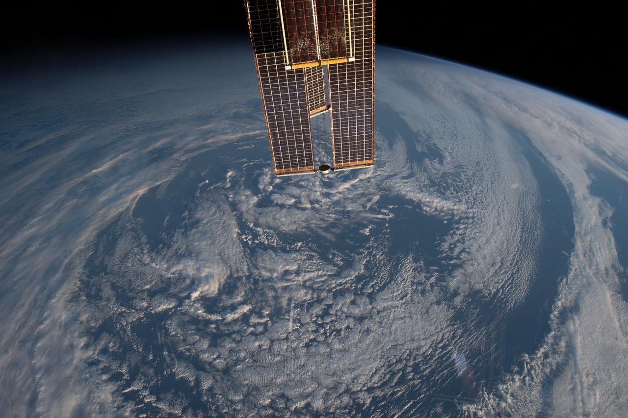iss069e027347 (July 2, 2023) --- The International Space Station was orbiting 270 miles above the south Atlantic Ocean about 350 miles north of South Georgia Island when this photograph was taken. In the top foreground, portions of the station's main solar array and roll-out solar array are also pictured.