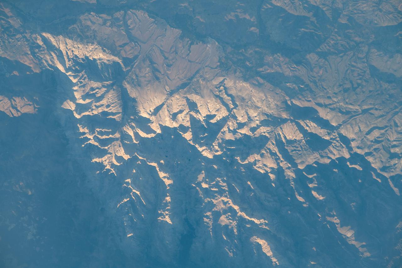 iss069e033761 (July 17, 2023) -- The Sun reflects off mountaintops as the International Space Station orbited roughly 260 miles above Turkey.