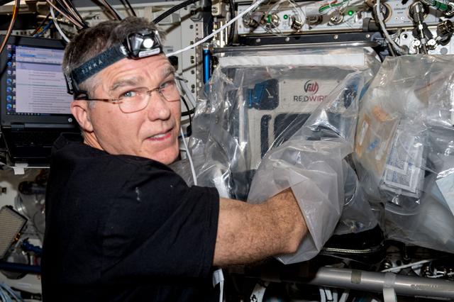 NASA image: Astronaut Stephen Bowen Works With BFF