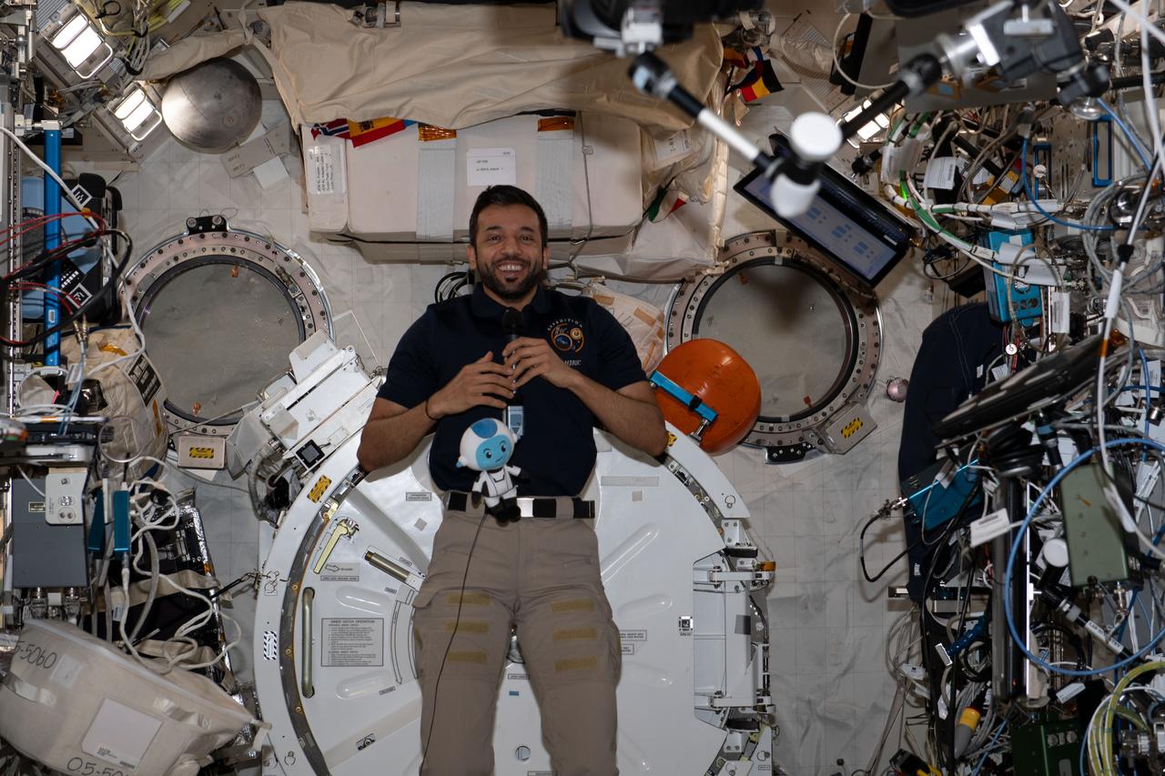 iss069e056189 (Aug. 10, 2023) --- UAE (United Arab Emirates) astronaut and Expedition 69 Flight Engineer Sultan Alneyadi is pictured in the International Space Station's Kibo laboratory module during a public affairs event with government officials, public and private employees, and students from the UAE.