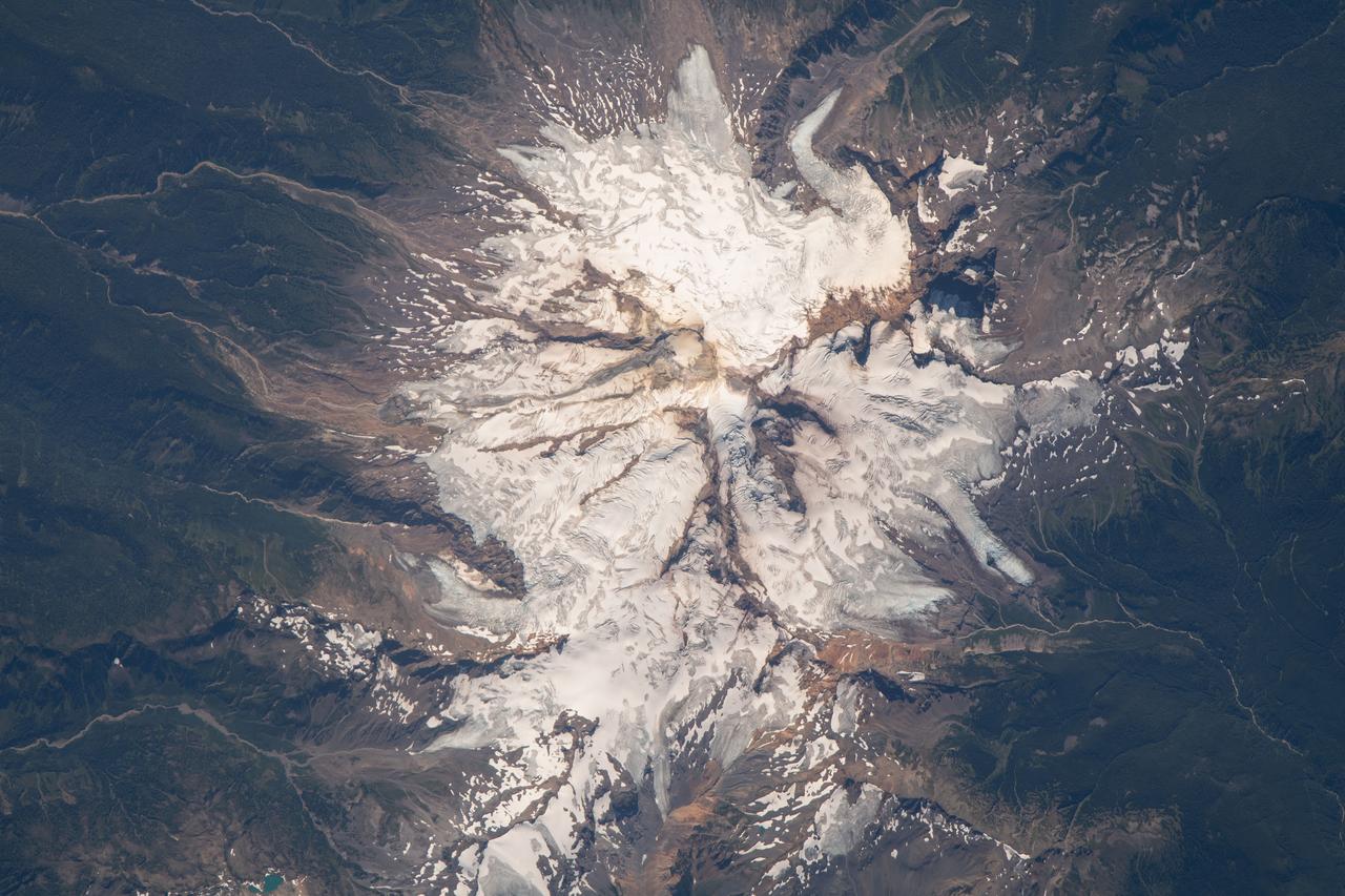 iss069e060816 (August 15, 2023) -- Mount Baker reaches over 10,700 feet of elevation in the state of Washington. The active glacier-covered stratovolcano was seen from the International Space Station as it orbited 265 miles above.