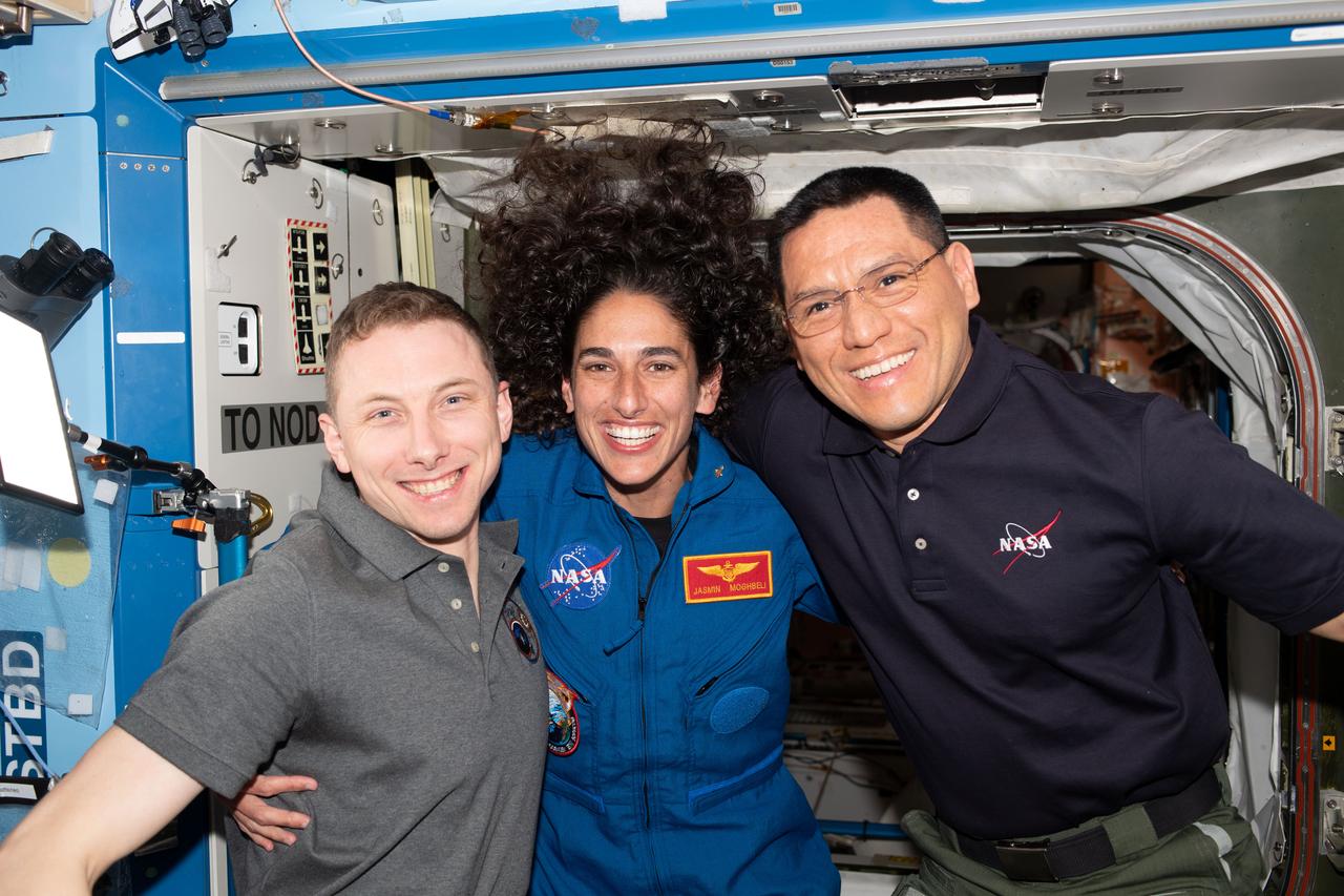 iss069e084754 (Aug. 29, 2023) --- From left, are Expedition 69 Flight Engineers Woody Hoburg, Jasmin Moghbeli, and Frank Rubio, all from from NASA, posing for a portrait aboard the International Space Station. The three astronauts were selected as part NASA's 22nd group of astronauts, nicknamed "The Turtles", in June of 2017.