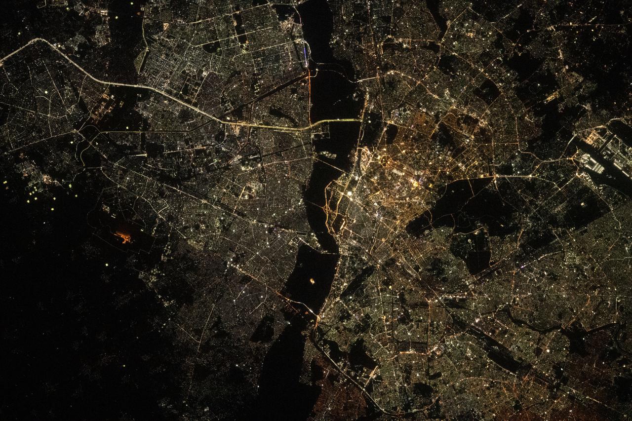 iss069e085761 (Sept. 2, 2023) --- The city lights of New Delhi, India, are split by the darkness of the Yamuna River in this photograph from the International Space Station as it orbited 257 miles above.