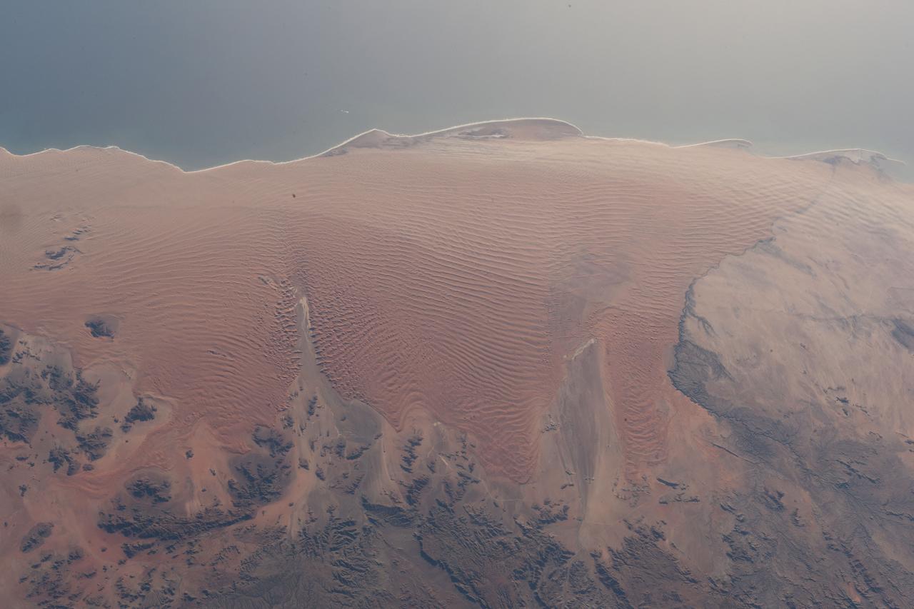 iss069e086612 (Sept. 11, 2023) --- The Namib Desert on the Atlantic coast of Namibia on the African continent is pictured from the International Space Station as it orbited 263 miles above.