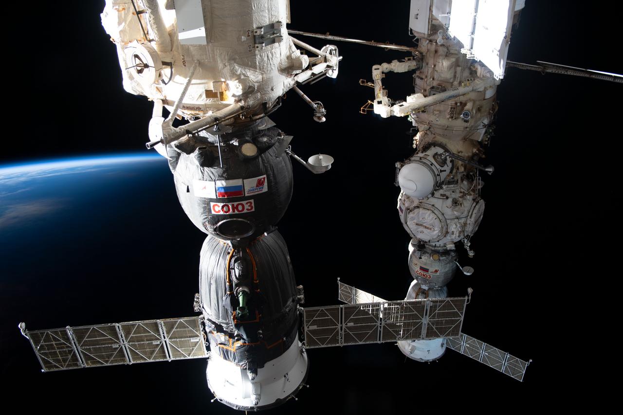 iss069e088557 (Sept. 15, 2023) --- The Soyuz MS-24 spacecraft (foreground) that carried NASA astronaut Loral O'Hara and Roscosmos cosmonauts Oleg Kononenko and Nikolai Chub to the International Space Station is pictured docked to the Rassvet module. In the rear, is the Soyuz MS-23 crew ship, docked to the Prichal docking module, that will return NASA astronaut Frank Rubio and Roscosmos cosmonauts Sergey Prokopyev and Dmitri Petelin back to Earth on Sept. 27.