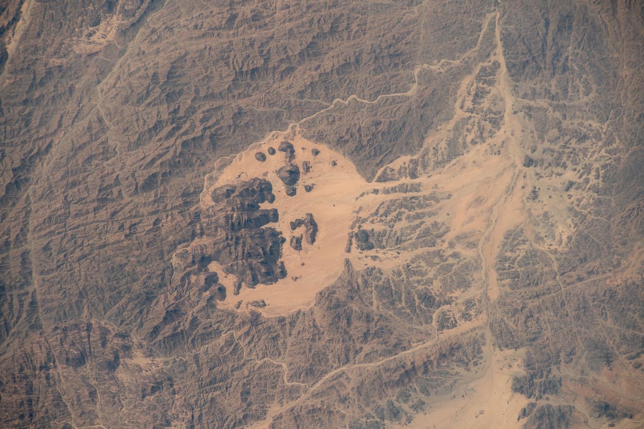 iss070e002272 (Oct. 6, 2023) --- The Jibāl Hawlad mountain range, near the Red Sea, is pictured in the African nation of Sudan as the International Space Station orbited 258 miles above.