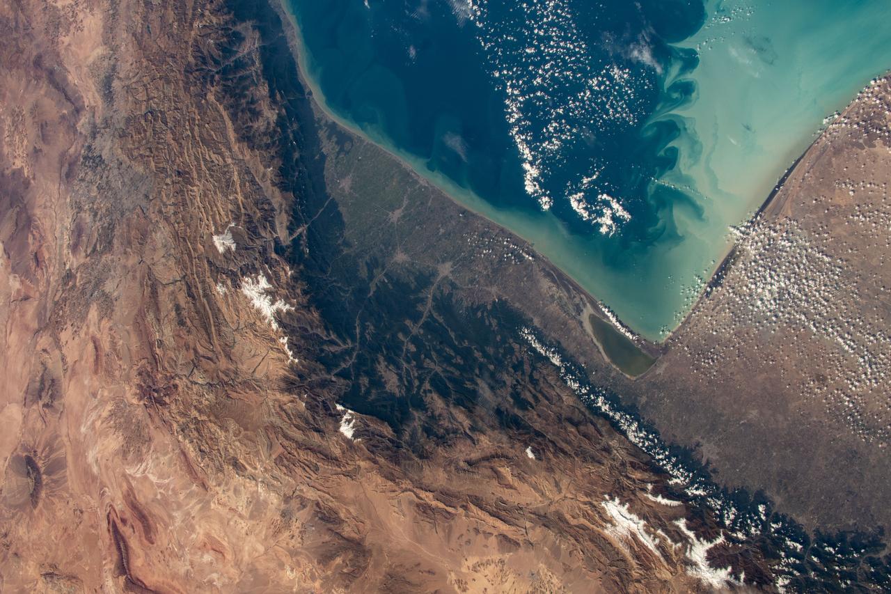 iss070e002303 (Oct. 6, 2023) --- The Caspian Sea and cities and towns on the coast of northern Iran are pictured from the International Space Station as it orbited 259 miles above.