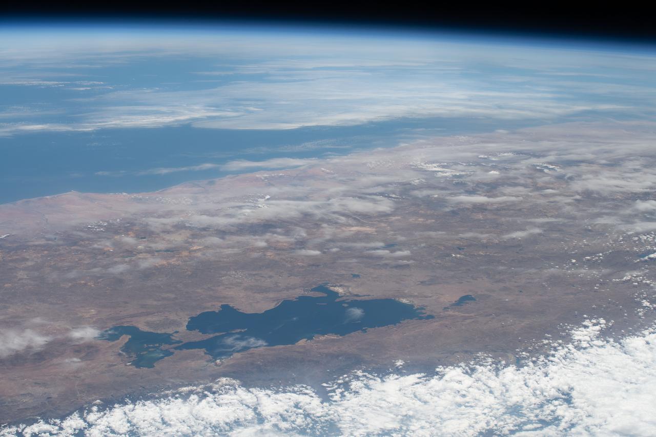 iss070e015250 (Oct. 29, 2023) --- Lake Titicaca, a freshwater lake nestled in between Peru and Bolivia in the Andes Mountains, is pictured from the International Space Station as it orbited 261 miles above the South American continent.