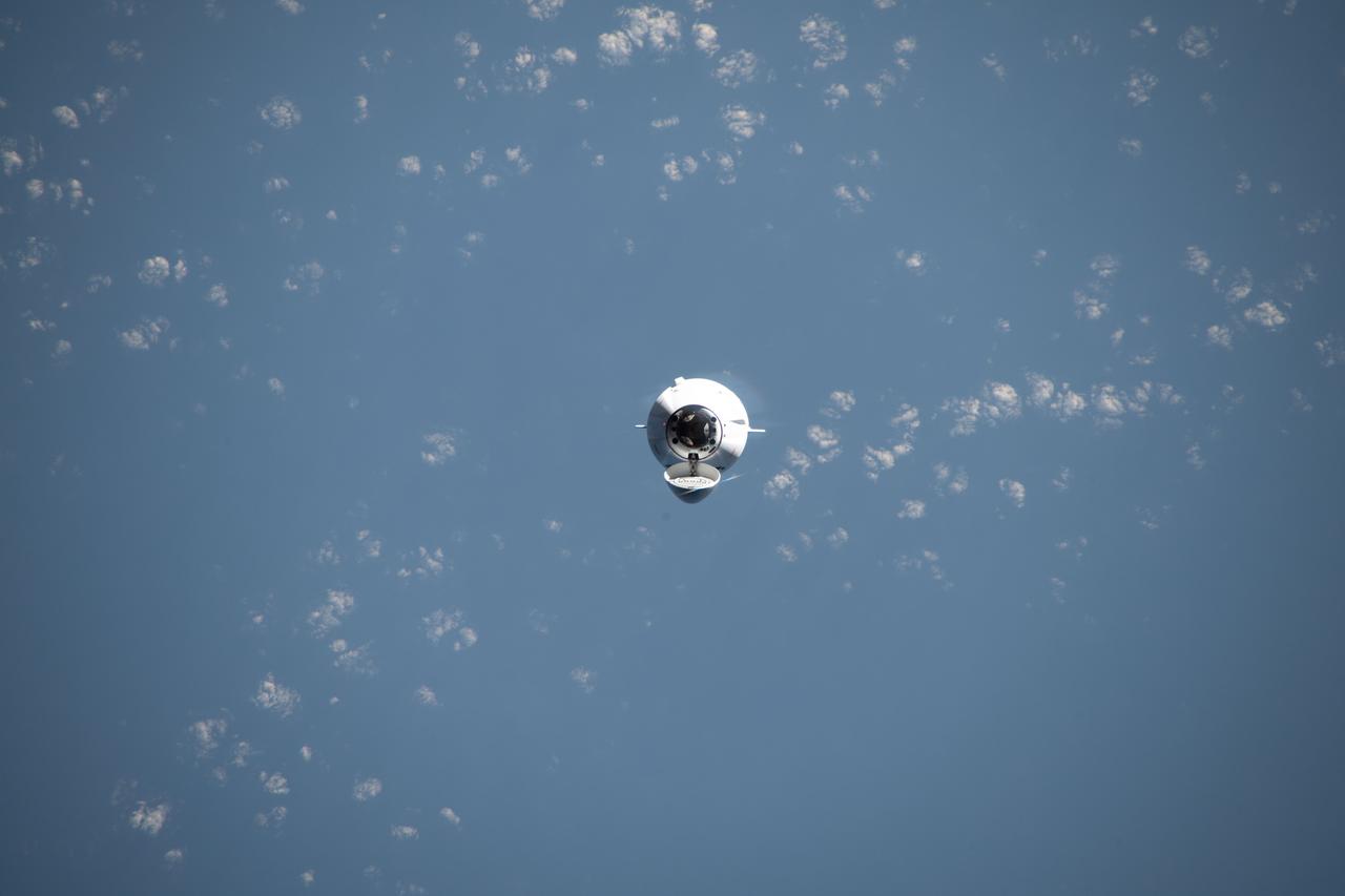 iss070e023576 (Nov. 11, 2023) --- The SpaceX Dragon cargo craft, on the company's 29th commercial resupply mission for NASA, approaches the International Space Station while orbiting 261 miles above the Indian Ocean in between Australia and Indonesia.