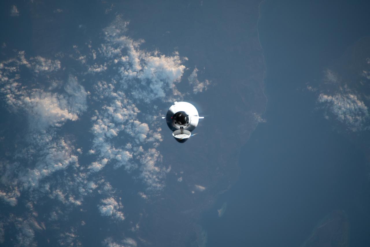 iss070e023587 (Nov. 11, 2023) --- The SpaceX Dragon cargo craft, on the company's 29th commercial resupply mission for NASA, approaches the International Space Station while orbiting 261 miles above the Lesser Sunda Islands.