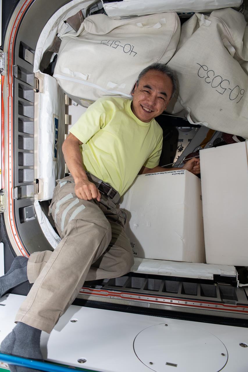 iss070e025067 (Nov. 16, 2023) --- JAXA (Japan Aerospace Exploration Agency) astronaut and Expedition 70 Flight Engineer Satoshi Furukawa works in the International Space Station's Tranquility module clearing hardware and making space inside the NanoRacks Bishop airlock.