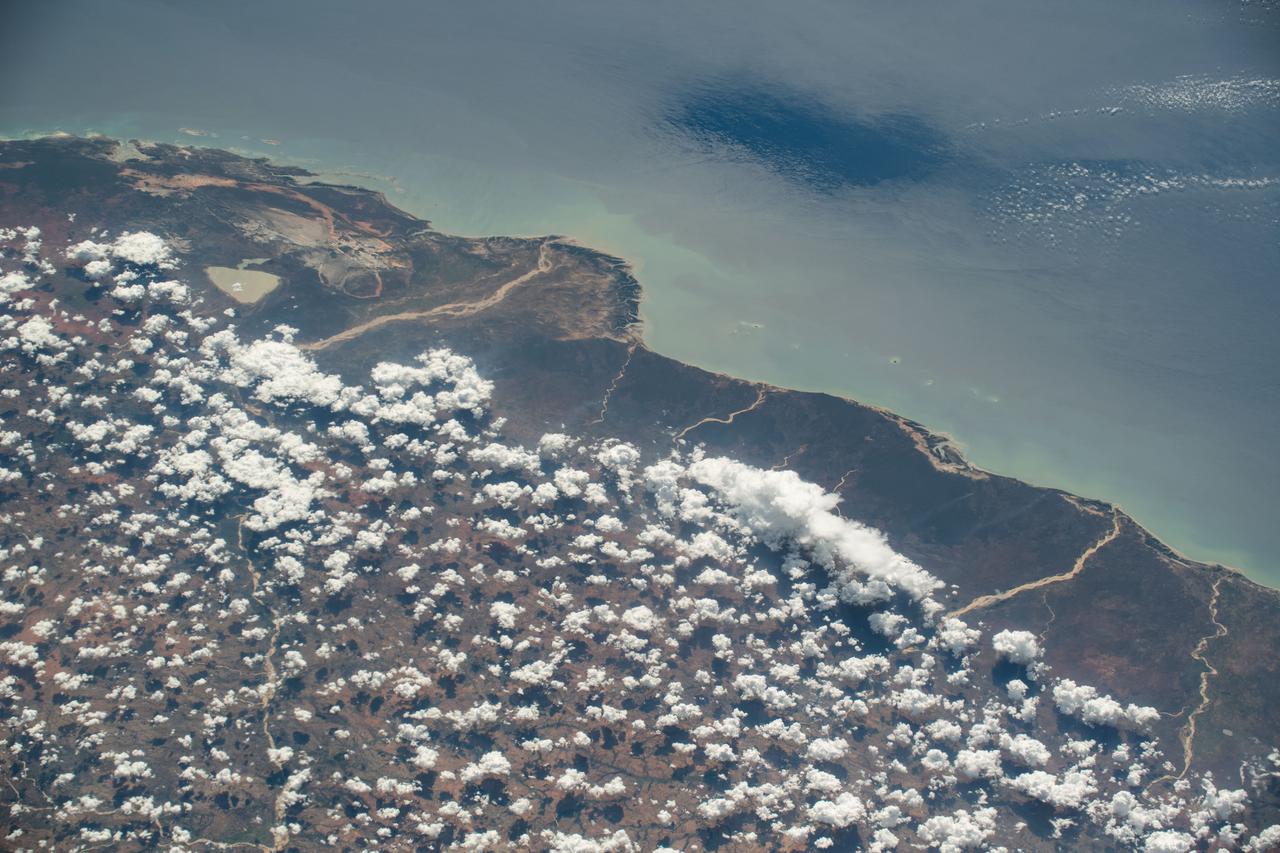 iss070e025919 (Nov. 16, 2023) --- The partly cloudy coast of southwestern Madagascar on the Mozambique Channel is pictured from the International Space Station as it orbited 264 miles above the island nation.