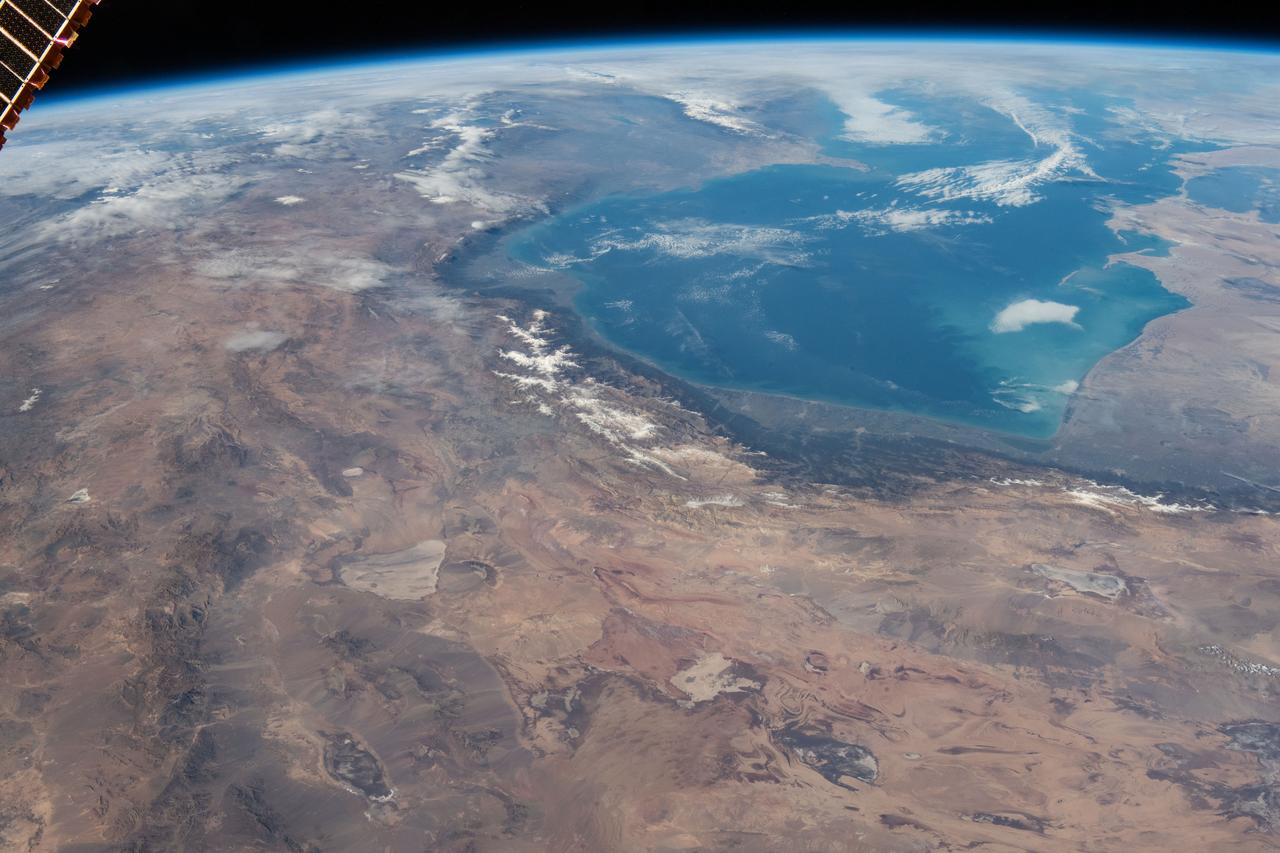 iss070e033711 (Nov. 30, 2023) --- The Caspian Sea is surrounded by the nations of Iran to the south, Azerbaijan to the west, and Turkmenistan and Kazakhstan to the east in this photograph from the Interational Space Station as it orbited 260 miles above.