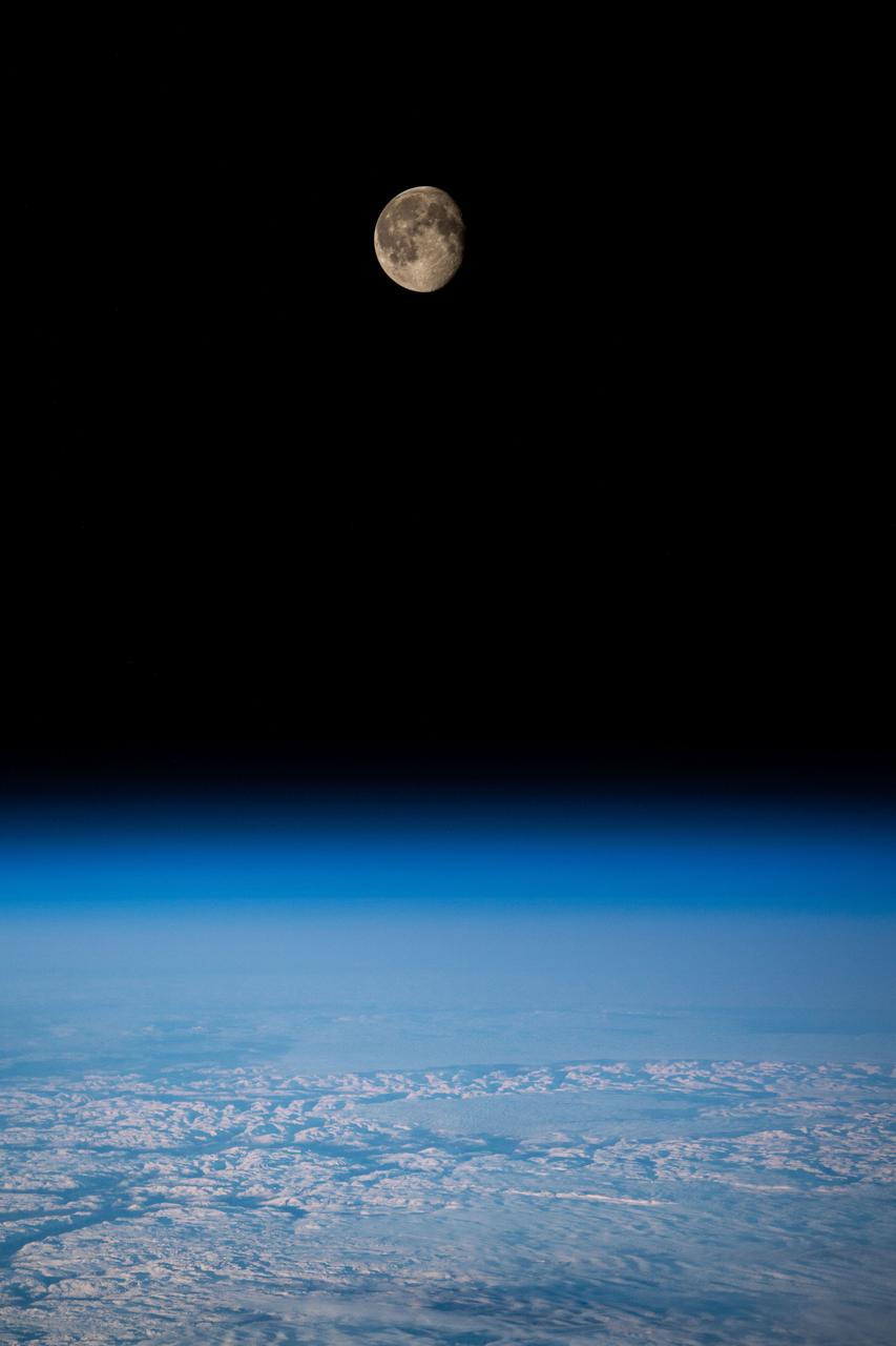 iss070e034731 (Nov. 30, 2023) --- The waning gibbous Moon is pictured from the International Space Station as it orbited 262 miles above the Swiss Alps.