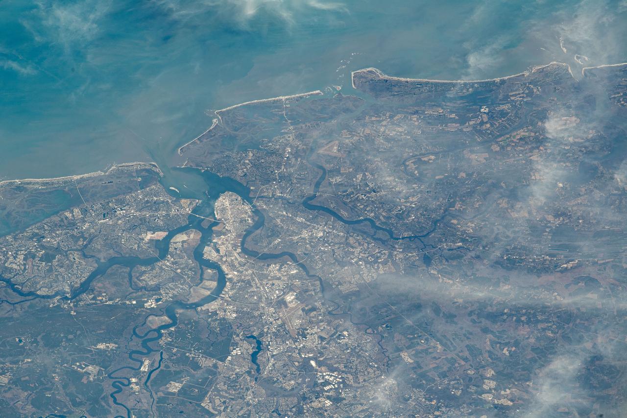 iss070e043540 (Dec. 20, 2023) --- Charleston, South Carolina, and its sourrounding suburbs are split by rivers and creeks emptying into the Atlantic Ocean in this photograph from the International Space Station as it orbited 259 miles above.