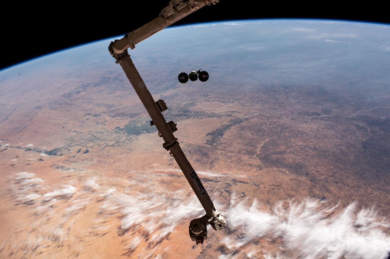iss070e044315 (Dec. 22, 2023) --- Northrop Grumman's Cygnus space freighter is pictured departing the International Space Station after it was released from the grip of the Canadarm2 robotic arm. The orbital complex was soaring 258 miles above the African nation of Mauritania at the time of this photograph.