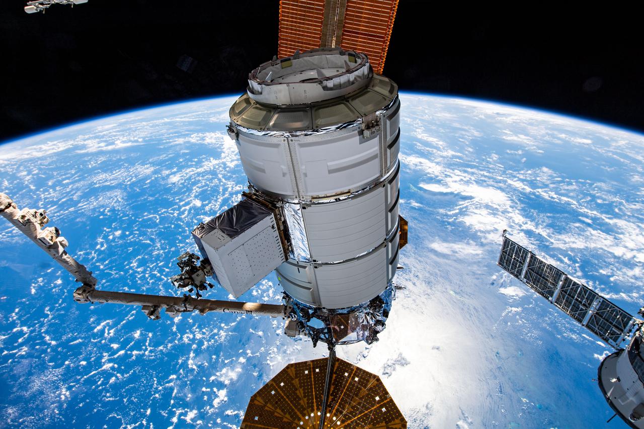 iss070e044474 (Dec. 22, 2023) --- Northrop Grumman's Cygnus space freighter is pictured in the grip of the Canadarm2 robotic arm shortly after it was detached from the Unity module. The orbital complex was soaring 260 miles above the island archipelago of Seychelles in the Indian Ocean at the time of this photograph.