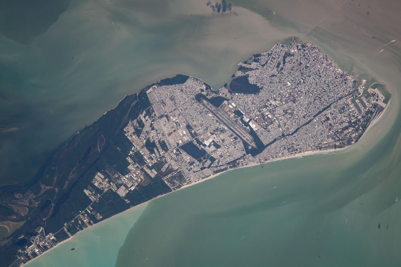 iss070e080020 (Jan. 23, 2024) --- Ciudad del Carmen, a city in the Mexican state of Campeche on the coast of the Gulf of Mexico that has grown from a fishing village to a petroleum and tourism-based economy, is pictured from the International Space Station as it orbited 260 miles above.